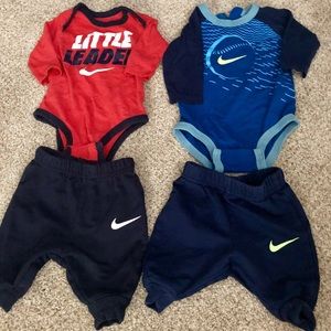 Two Nike 0-3 month outfits